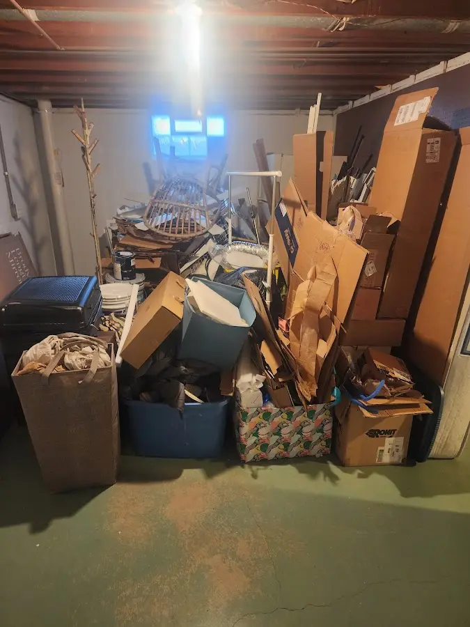 Roll-off dumpster container at job site for 2 Yard Dumpster Rental in East Marlborough